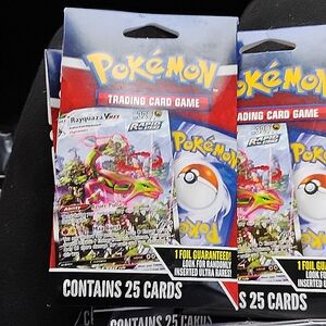 Pokemon trading cards, 25 cards each, 8 packs